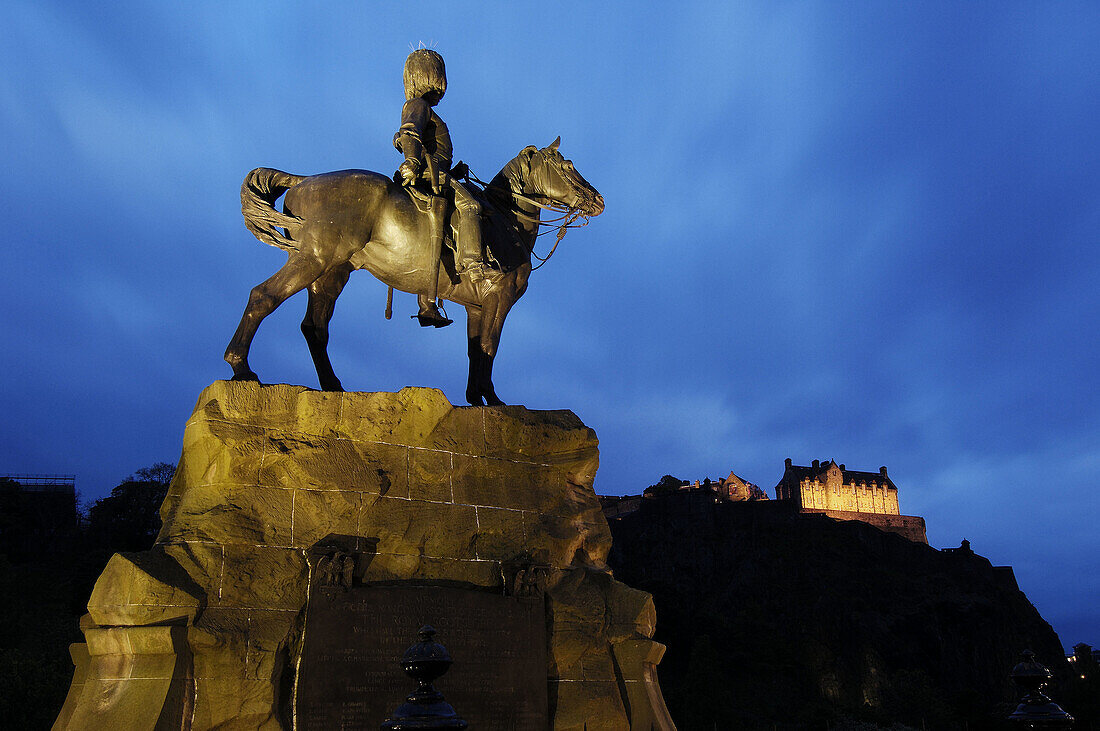 Edinburgh Castle at dusk from Princes Street, Edinburgh. Scotland, UK