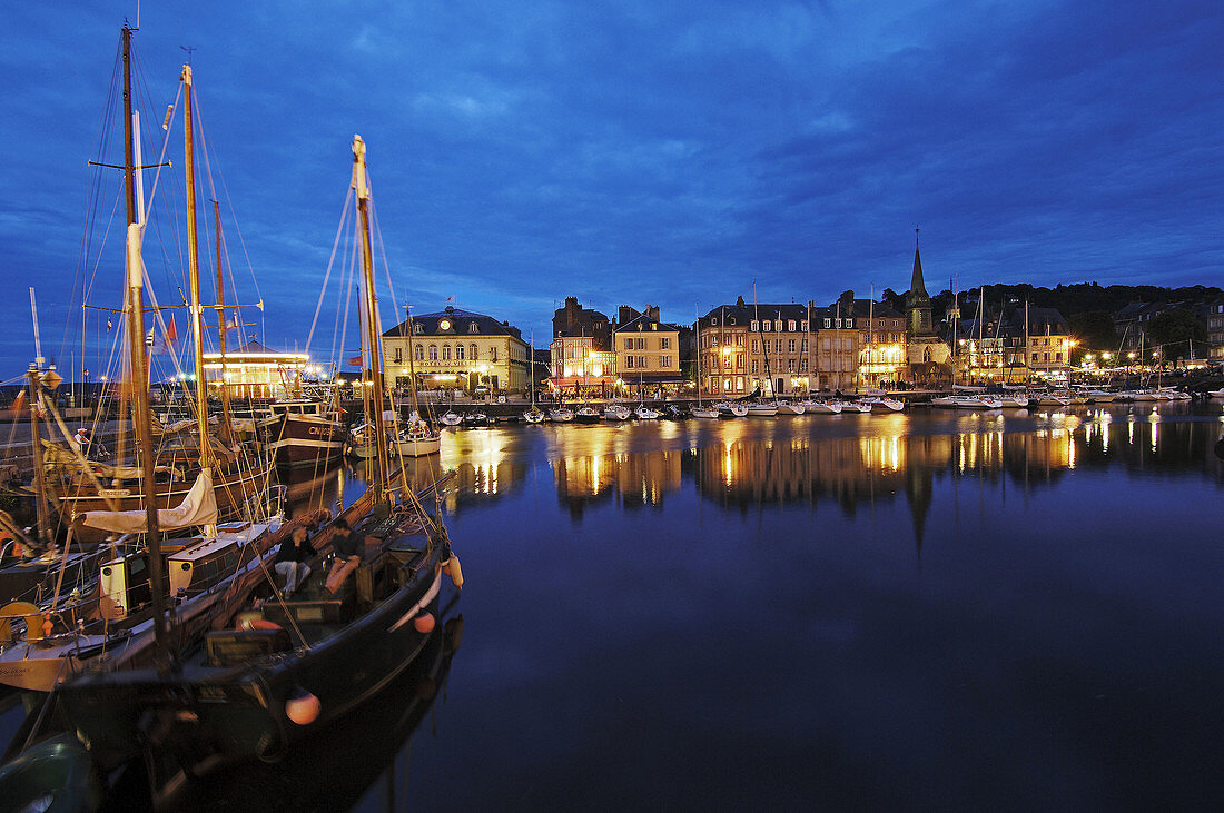 Honfleur Harbour at dusk. Calvados, Normandy, France