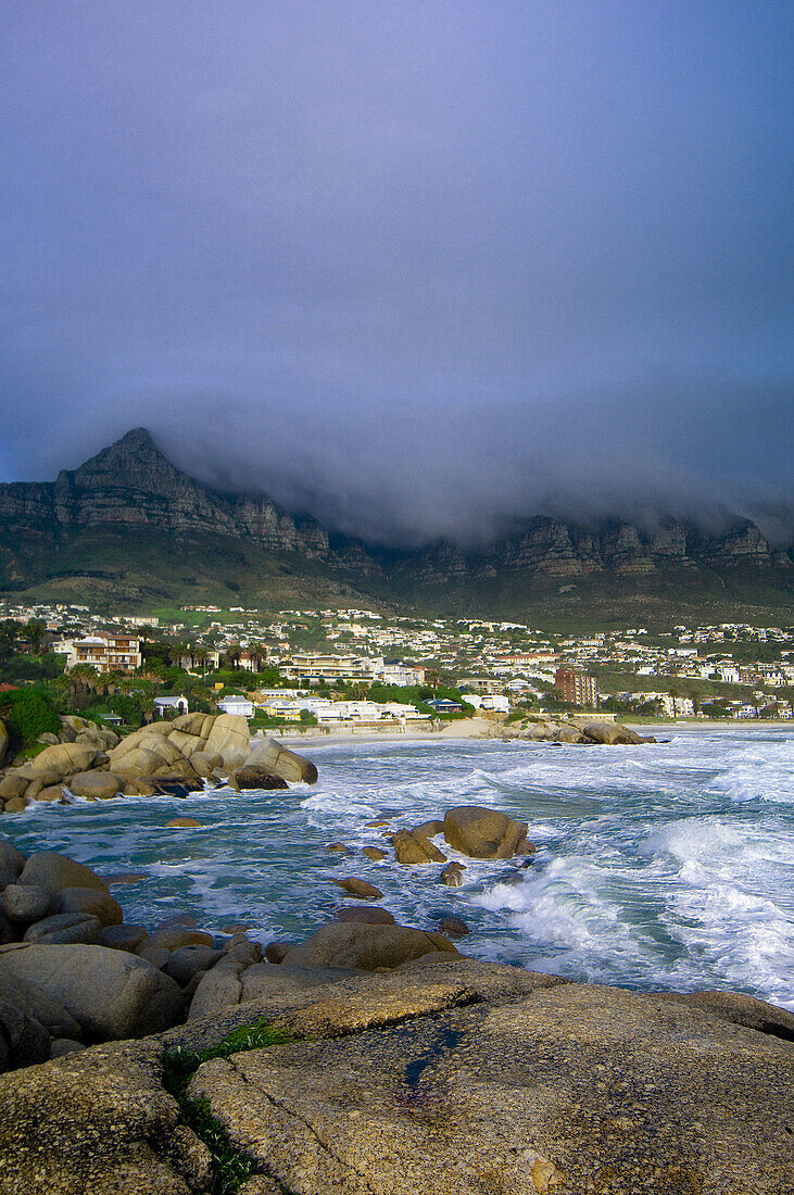 Glen Beach, Camps Bay, with the Twelve Apostles in the background near Cape Town, South Africa