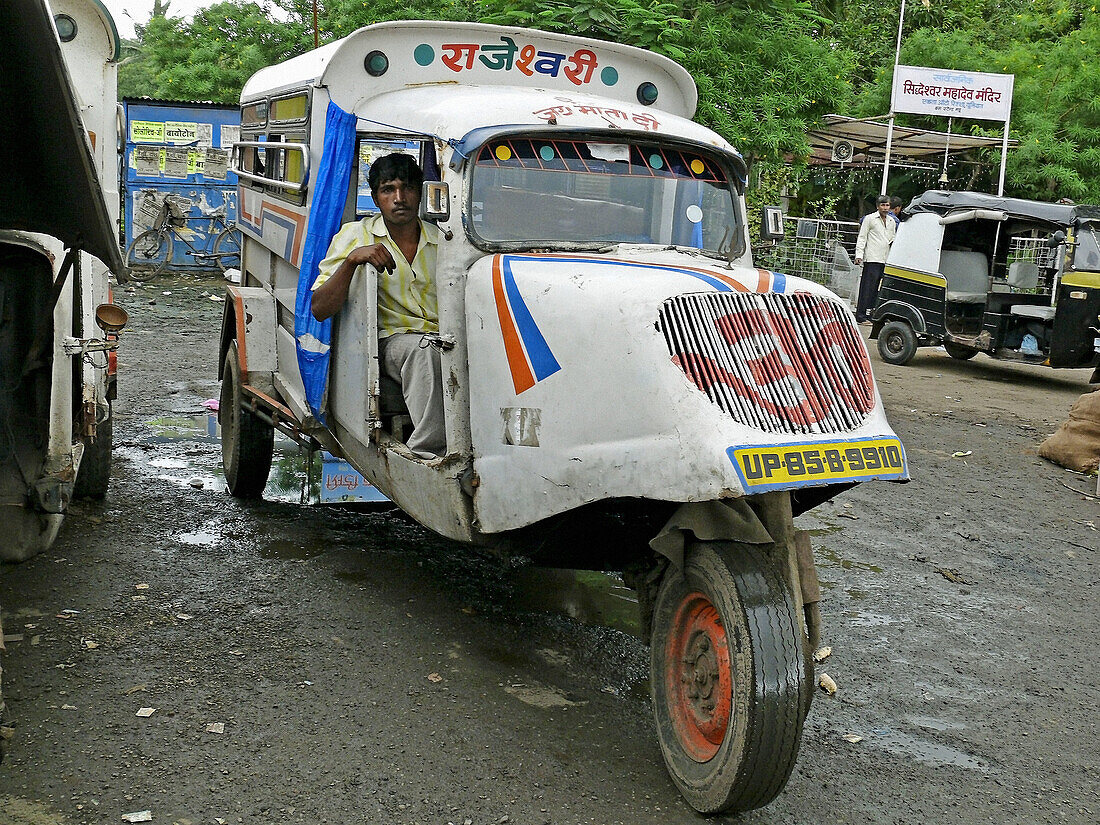 A man driver is travelling Mad max local transports vehicle along the road  Mhow, Madhyaprsdesh, India