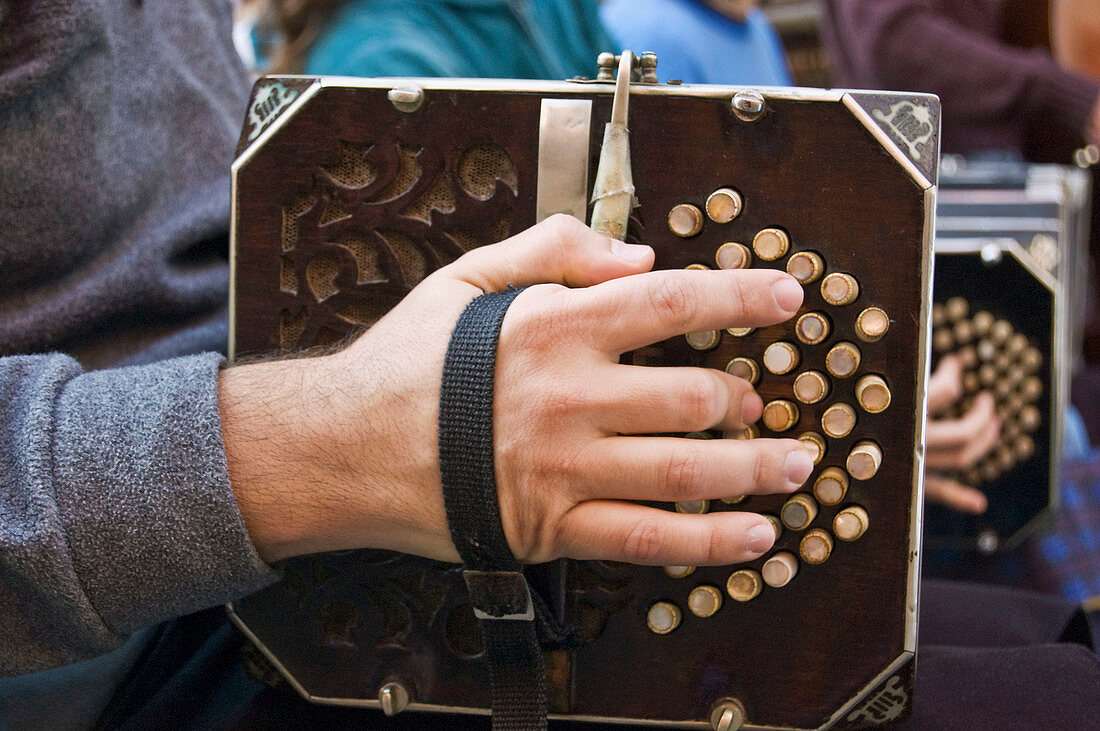 Bandoneon player in a street Tango orchestra, San Telmo District, Buenos Aires, Argentina