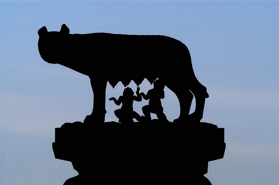 Statue of Romulus and Remus suckling silhouetted, Capitoline Hill, Rome, Italy, Europe