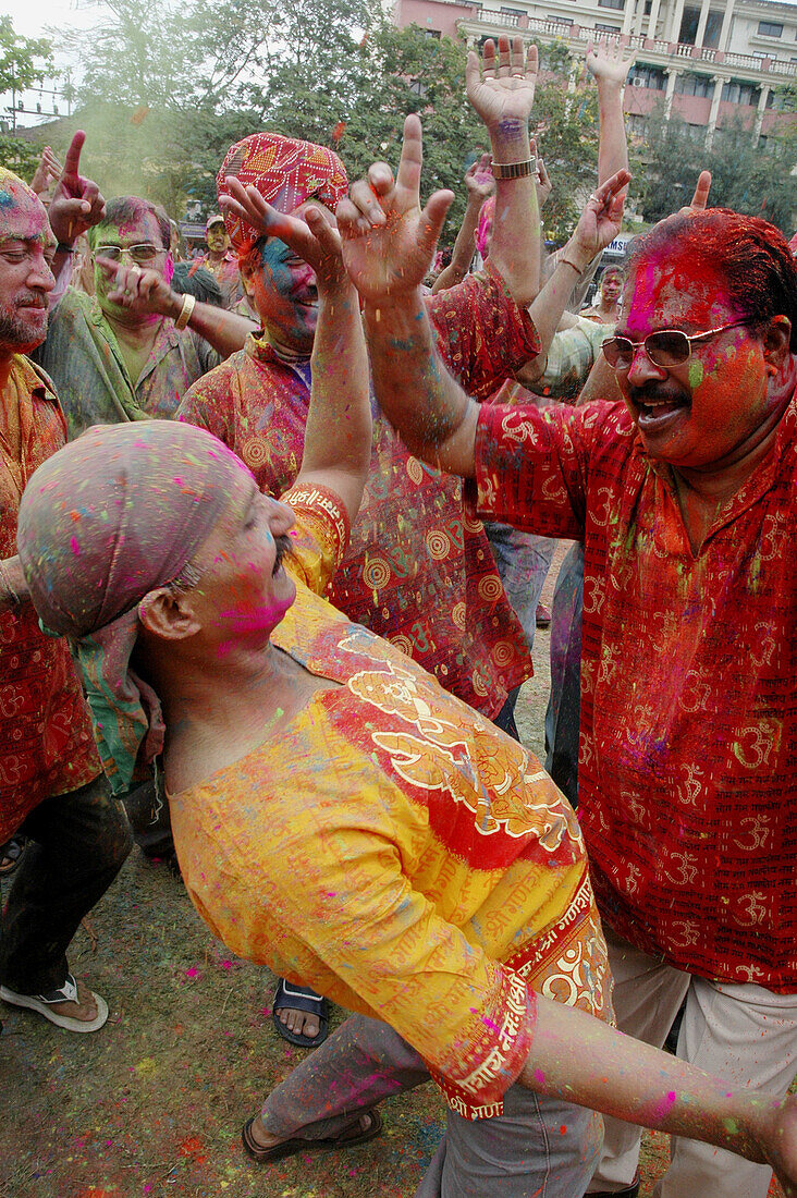 Panjim Goa, India, men dancing during the Holi feast