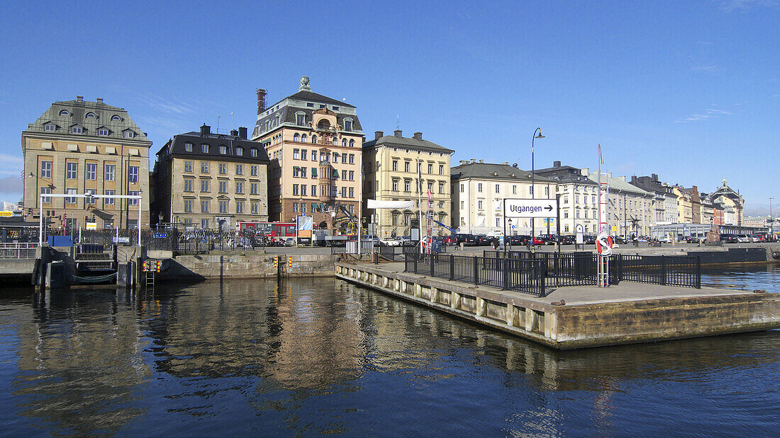 Skeppsbron quay in Stockholm, Sweden. The old town in the background.