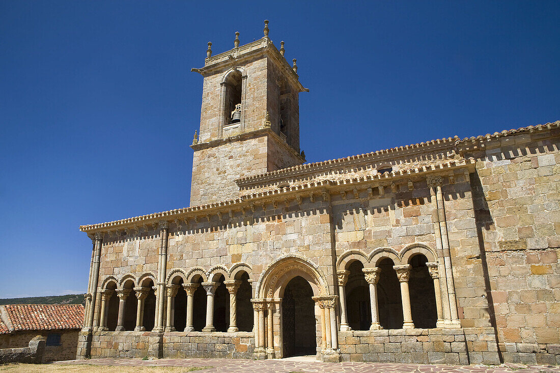 Romanesque church porticoed of San Juan y Santa Basílica; in Rebolledo de la Torre, in northern Burgos, Castilla y León, Spain, Europe.