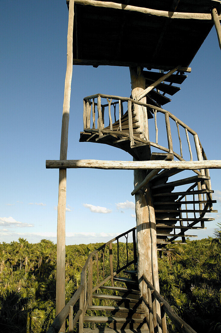 Caribbean wooden spiral staircase