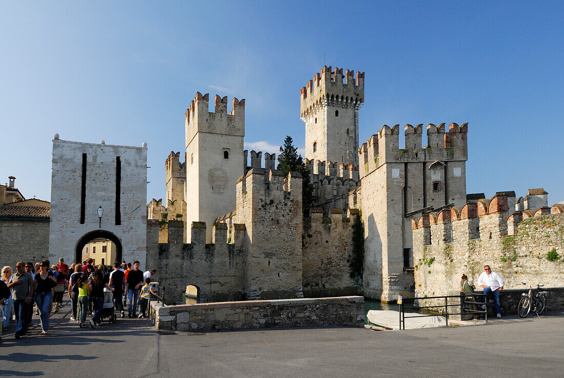 Visitors near Castello Scaligero, Sirmione, Lombardy, Italy
