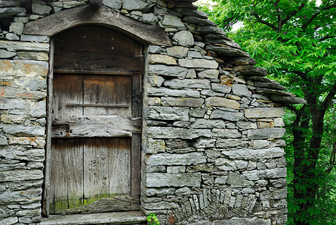 Hay shed with old wooden door, Pila, Centovalli, lake Maggiore, Lago Maggiore, Ticino, Switzerland