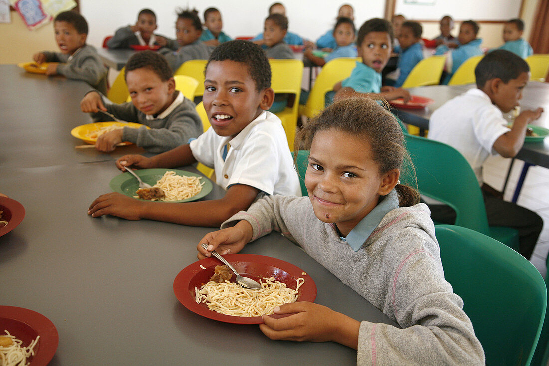 NAMIBIA  Children eating lunch at Rehobeth Primary School