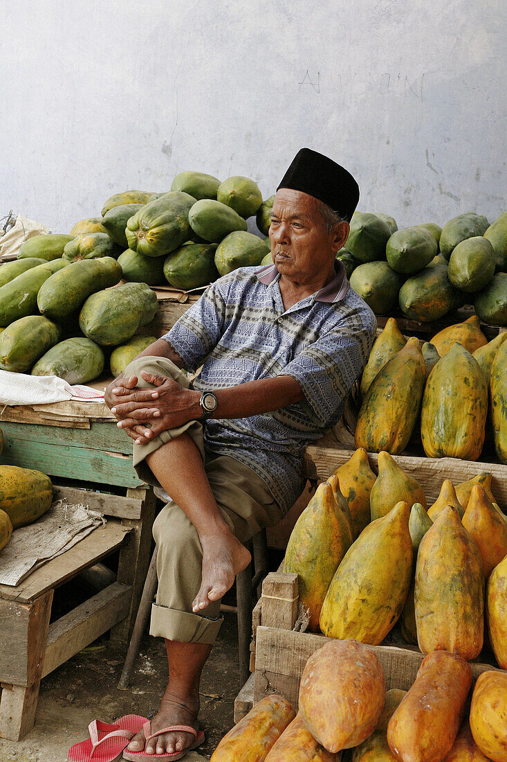 INDONESIA   Man selling papayas, Banda Aceh, Aceh, 2 years after the Tsunami