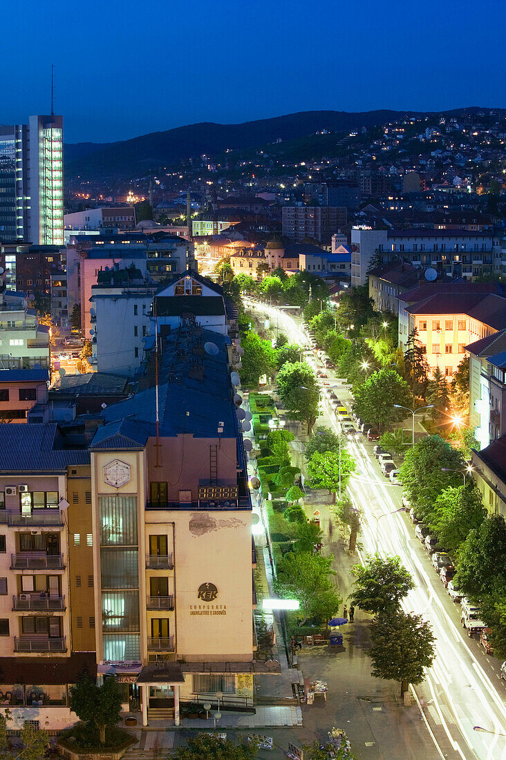 Kosovo. Prishtina. Traffic on Boulevard Mother Teresa / Evening