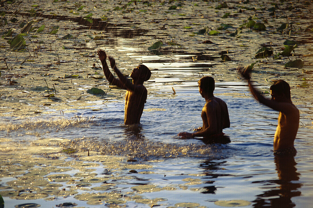 Men bathing, Sri Lanka