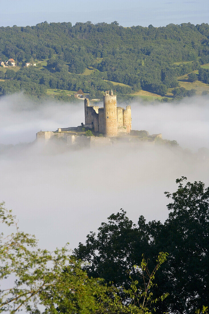 Najac village & castle in morning mist, Aveyron, France