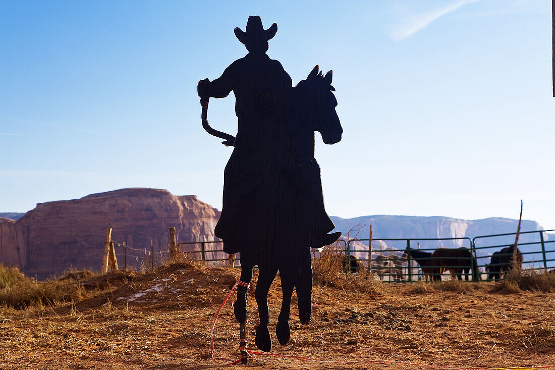 Cowboy silhouette, Monument Valley, Arizona, USA. Silhouette of cowboy