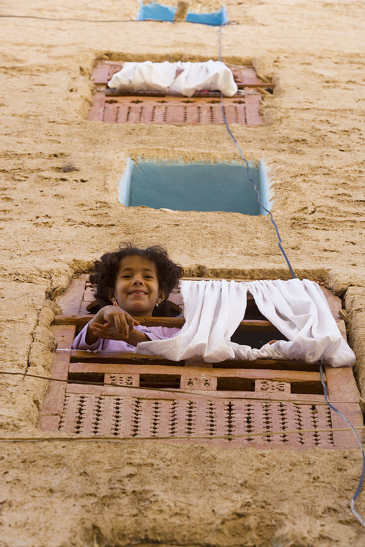 Young girl at window. Shibam, Wadi Hadhramawt, Yemen
