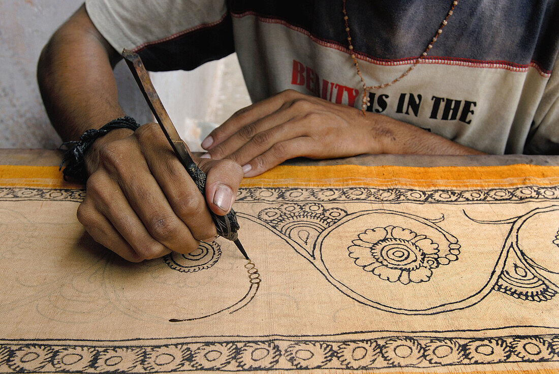 Sri Kalahasti is famous for Kalamkari, a method of painting natural dyes on cotton or silk with a bamboo pen. Figures of gods, trees and birds are first drawn on the fabric and then painted.