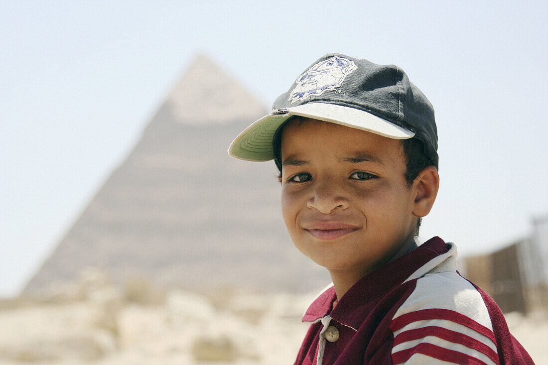 Portrait of Boy sale beverage in pyramids area, Giza, Egypt