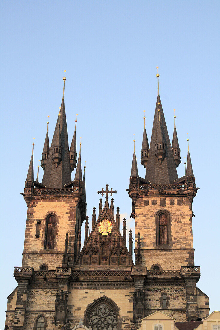 Façade of Tyn Church on Old Town Square in late afternoon sunlight, Prague. Czech Republic