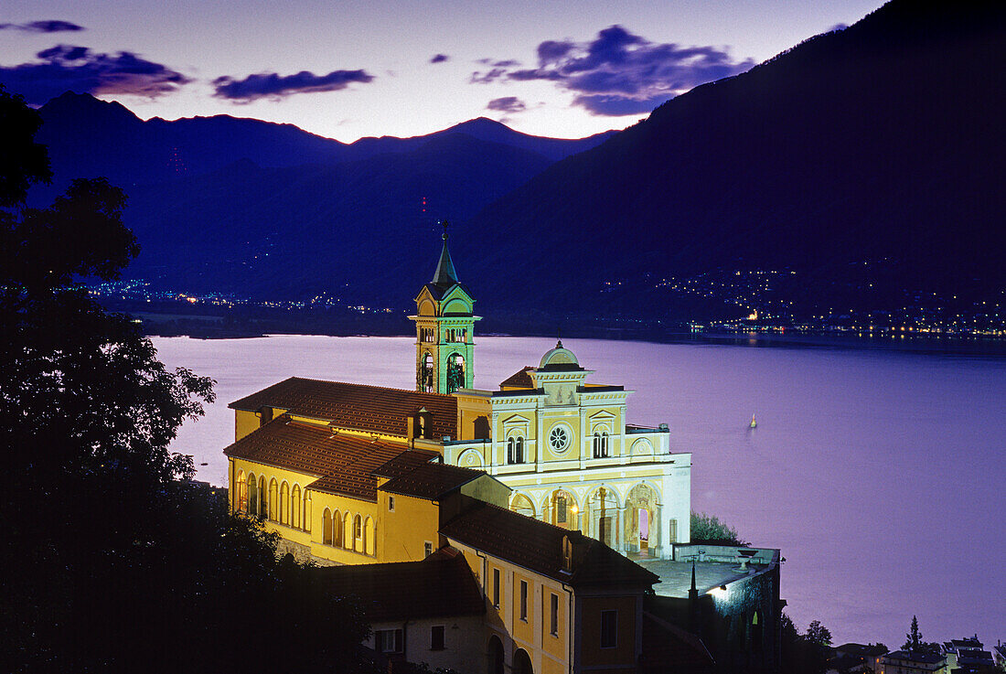 The illuminated church Madonna del Sasso in the evening, Locarno, Lago Maggiore, Ticino, Switzerland, Europe