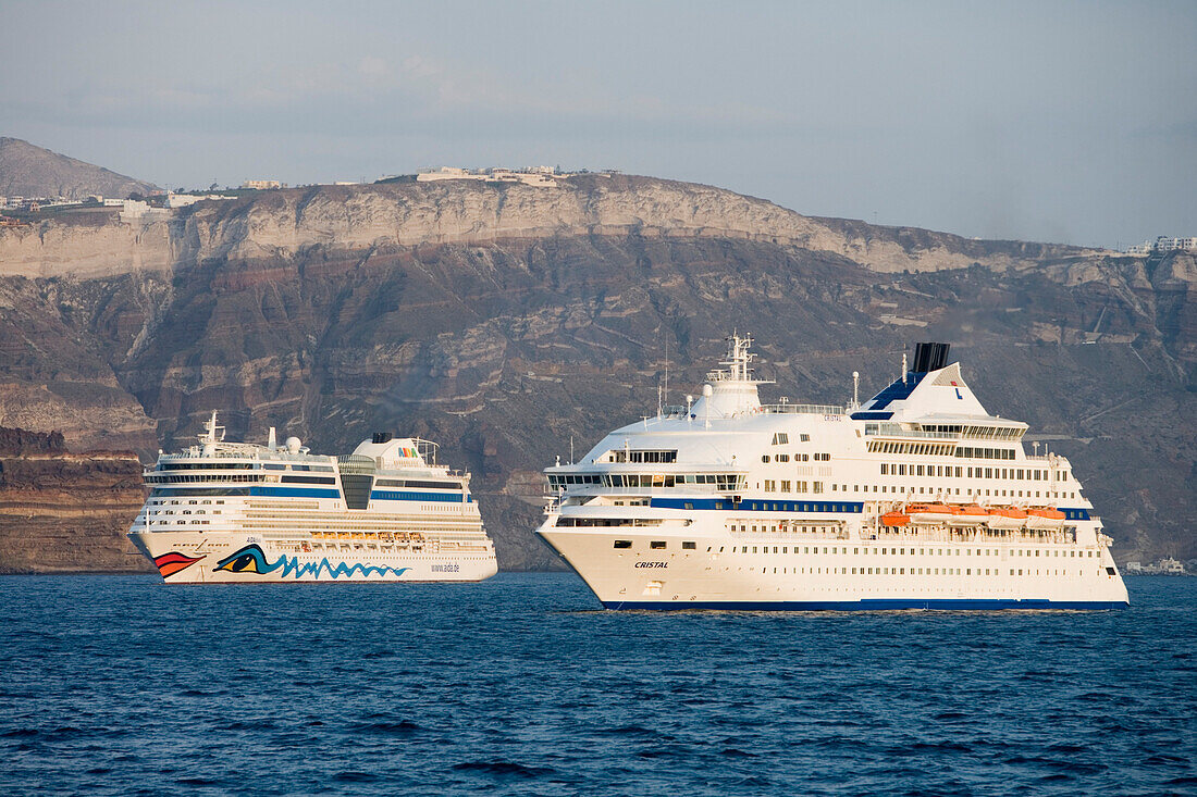Cruiseships AIDAdiva and Cristal anchoring off the coast, Santorini, Greece, Europe