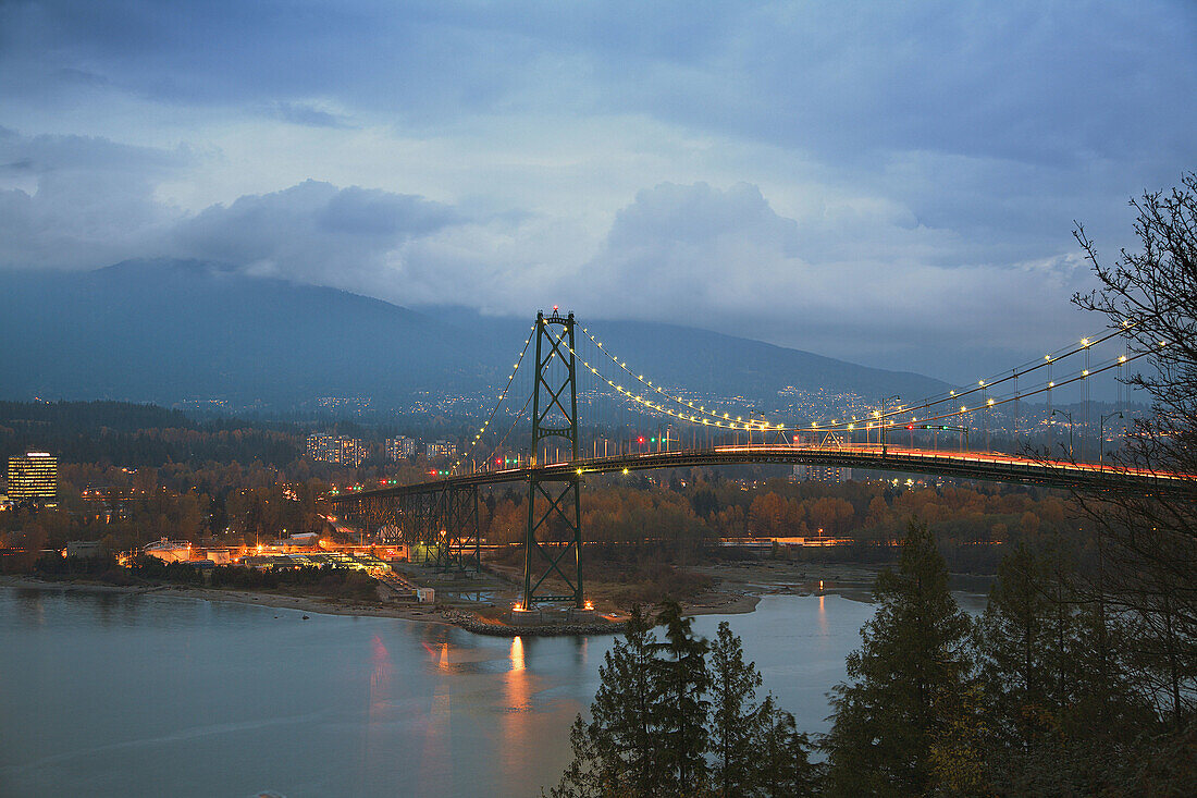 Lions Gate Bridge above the Burrard Inlet during dusk, Vancouver, British Columbia, Canada