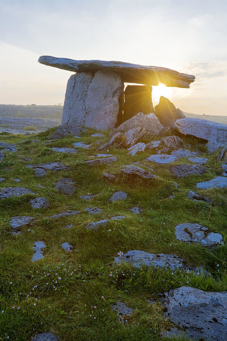 Poulabrone Megalithic Tomb with rising sun, Ireland