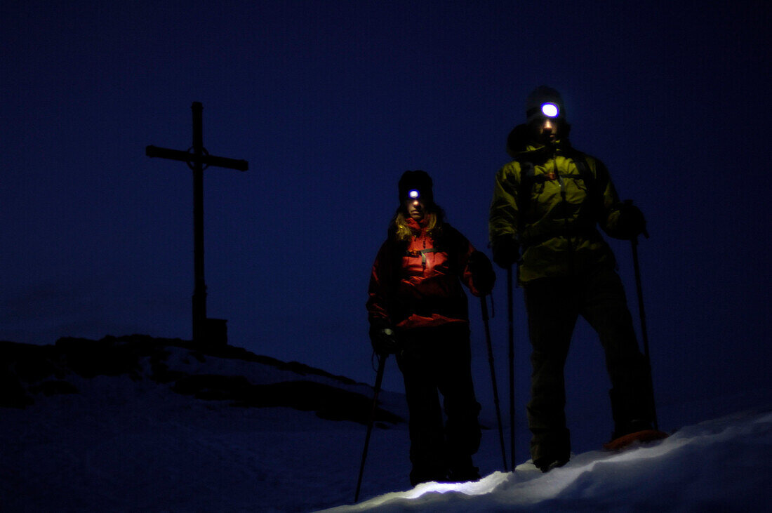 Snowshoeing on Hochgrat at night, Allgäu Alps, Bavaria, Germany, Europe