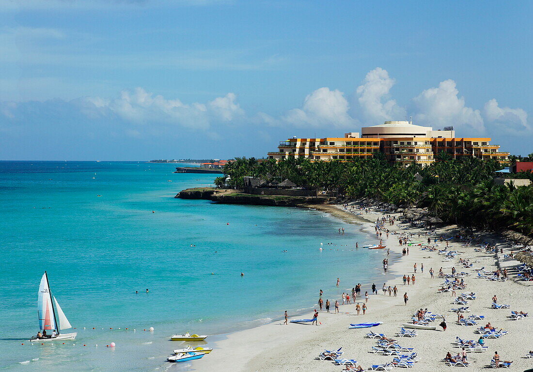 People at beach, Hotel Melia Varadero in background, Varadero, Matanzas, Cuba, West Indies