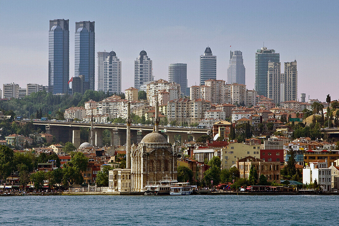 Ortakoy Mosque and Levent financial district skyline,  Istanbul,  Turkey
