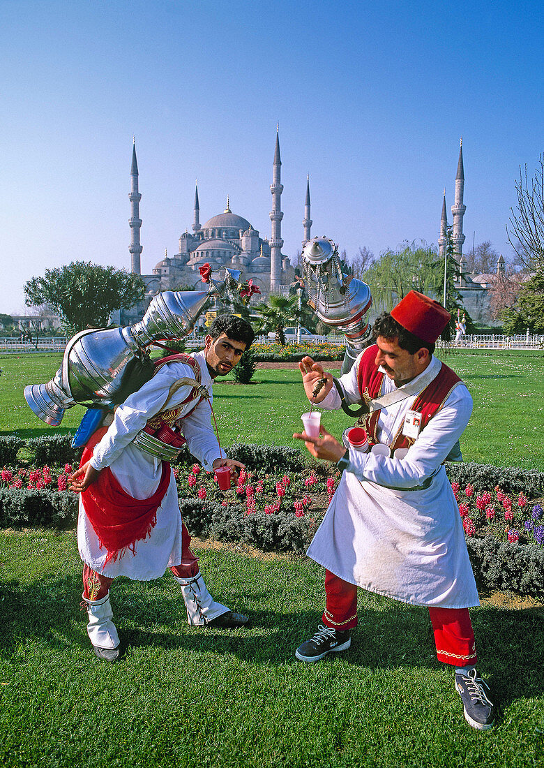 Cherry juice vendors and Blue Mosque in background,  Istanbul,  Turkey