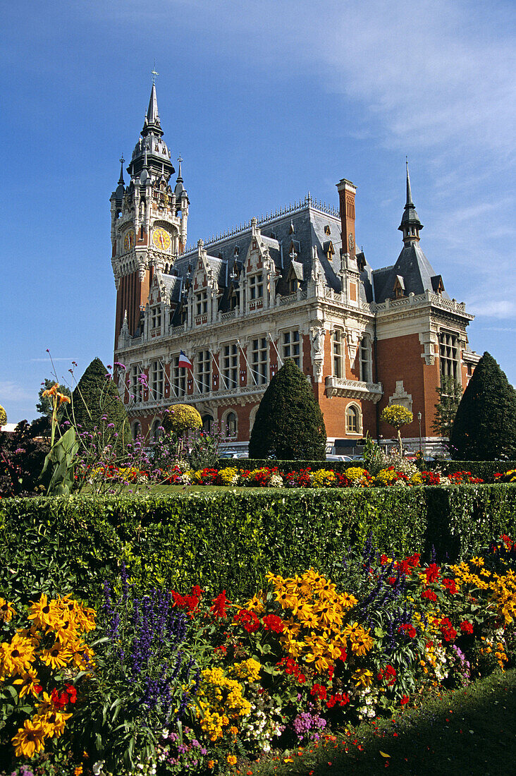 Colourful flowers and Town Hall, Calais, France