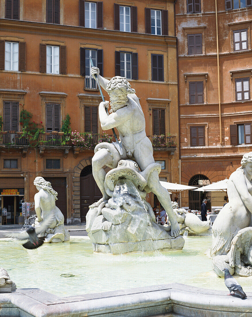 Statue in fountain in Piazza Navona, Rome, Lazio, Italy