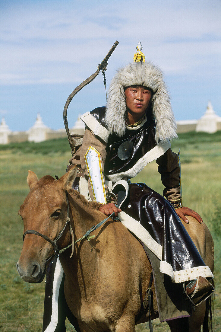 Rider dressed for a festival commemorating the 800th birthday of the mongolian empire. Erdene Zuu monastery. Kharkhorin. Mongolia
