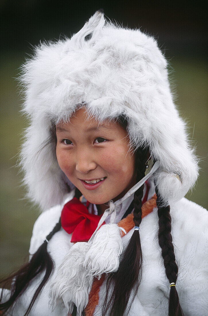 Tsaatan children dressed with reindeer skins Reindeer herders festival Jankhai Khovsgol lake Mongolia