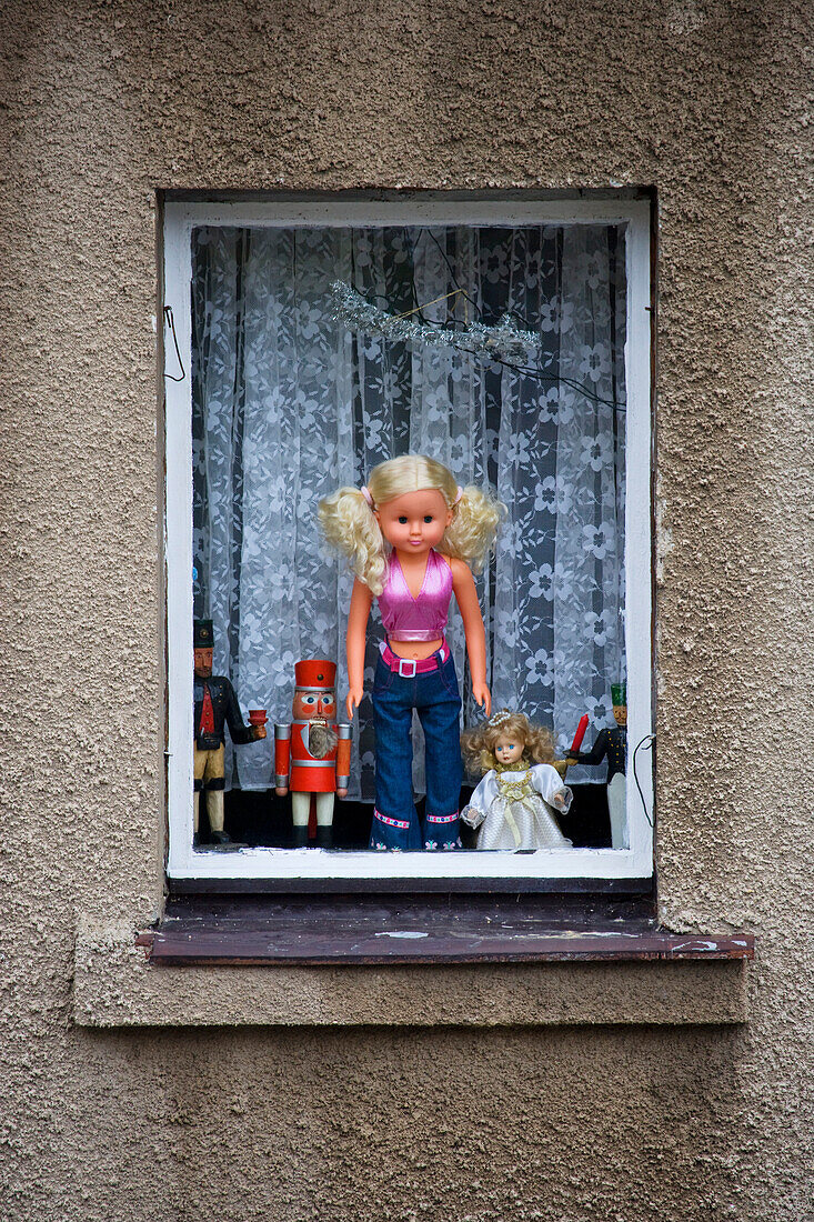 Doll in a window, Schwarzenberg, Ore mountains, Saxony, Germany