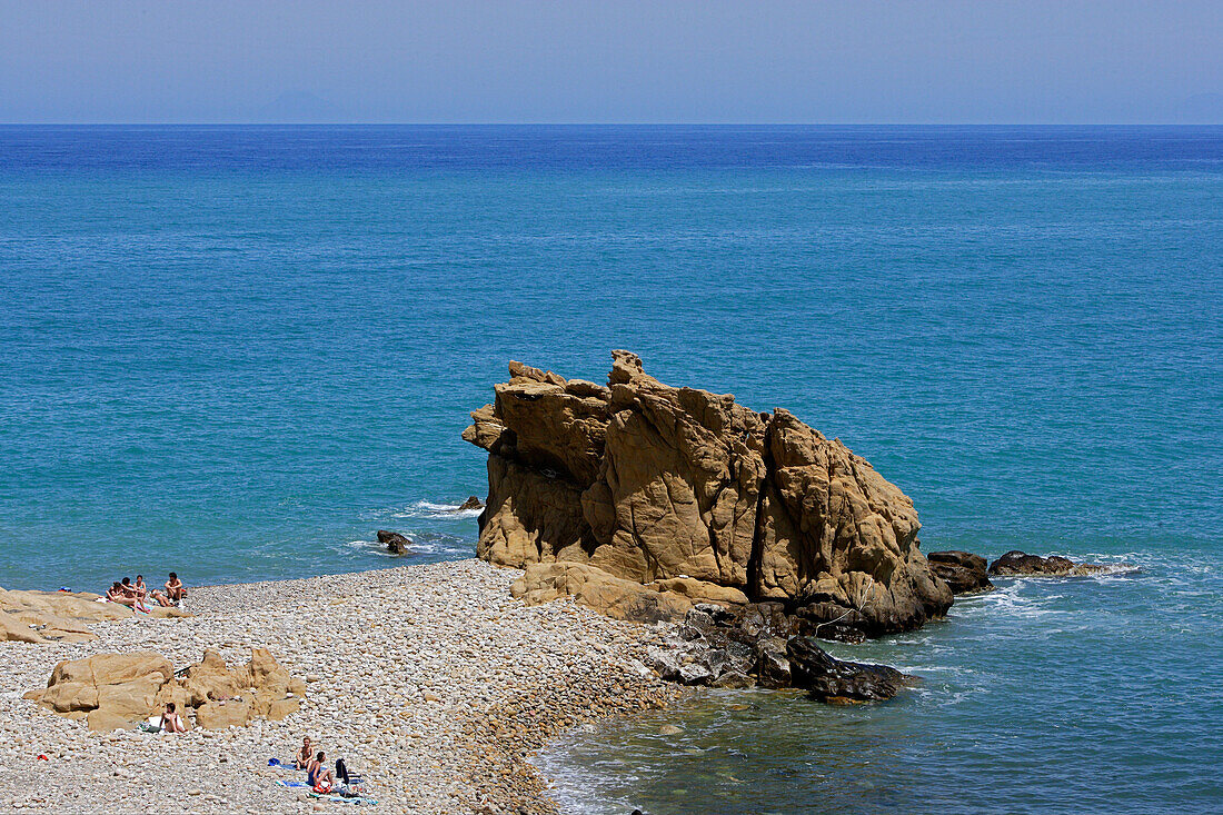 People on the beach in the sunlight, Castel di Tusa, Sicily, Italy, Europe