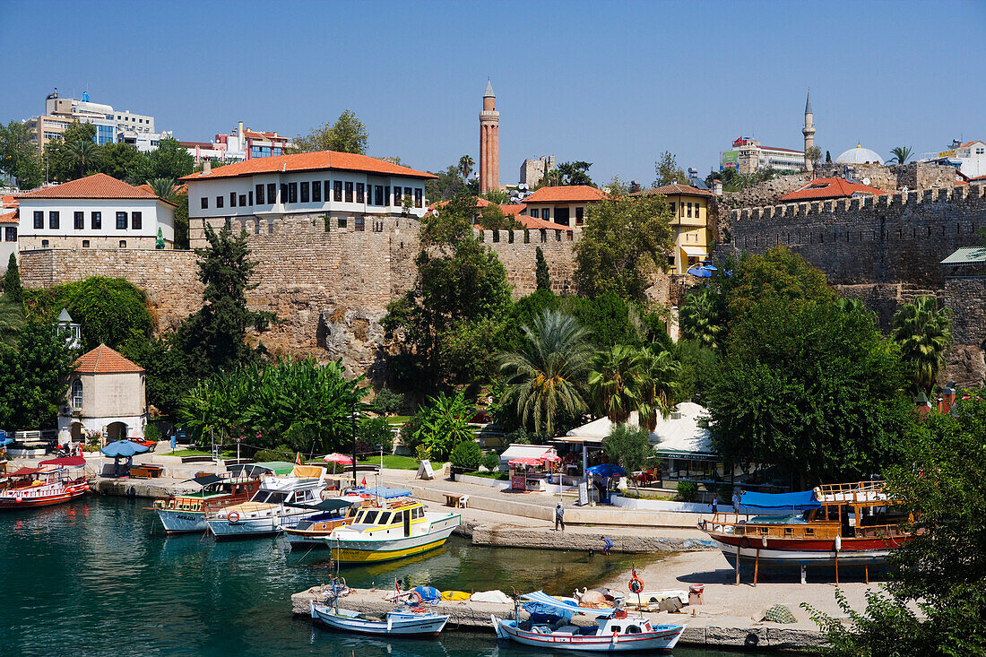 View at boats at harbour in front of the city walls, Antalya, Turkey, Europe