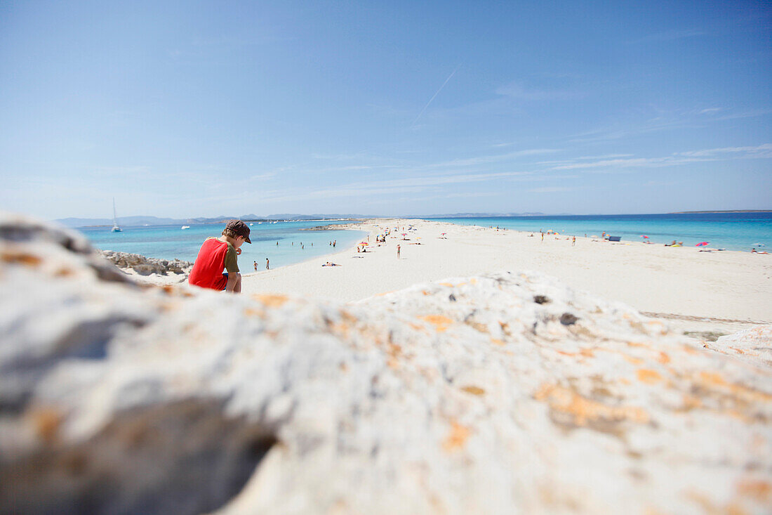 Boy on the beach, les Illetes und Llevant beach, Formentera, Balearic Islands, Spain