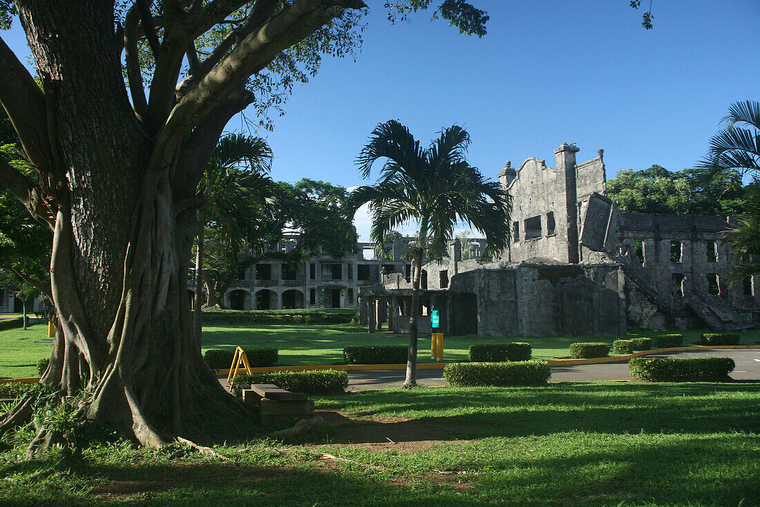 Decayed barracks and theater under blue sky, Corregidor Island, Manila Bay, Philippines, Asia