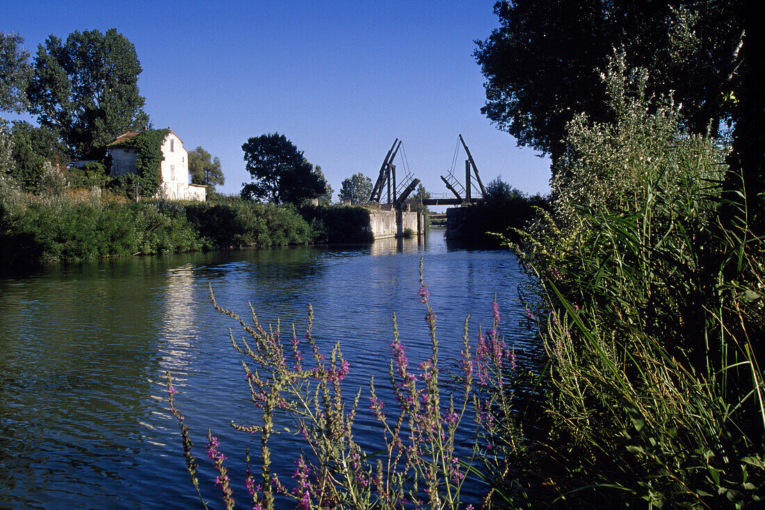 Bascule bridge above a river under blue sky, Bouches-du-Rhone, Provence, France, Europe