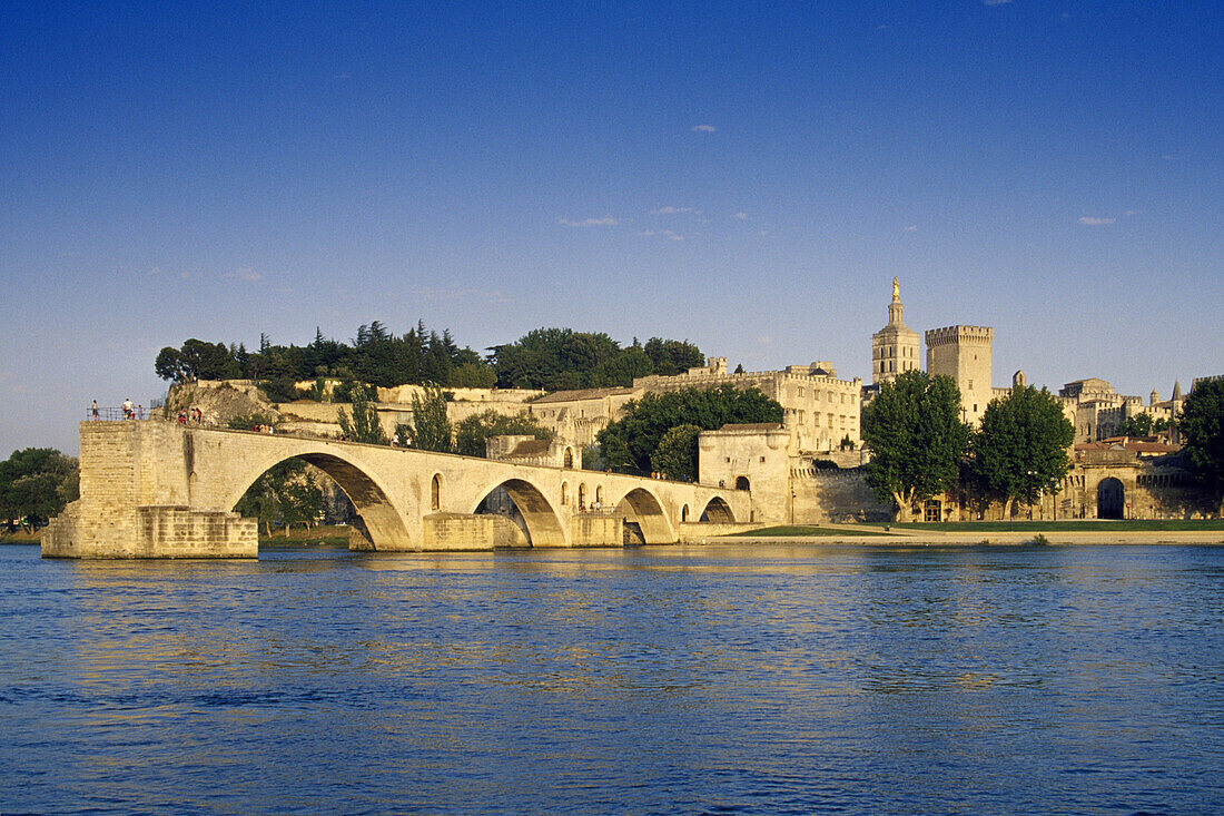 The bridge Pont St. Benezet and the palace of the pope under blue sky, Avignon, Vaucluse, Provence, France, Europe
