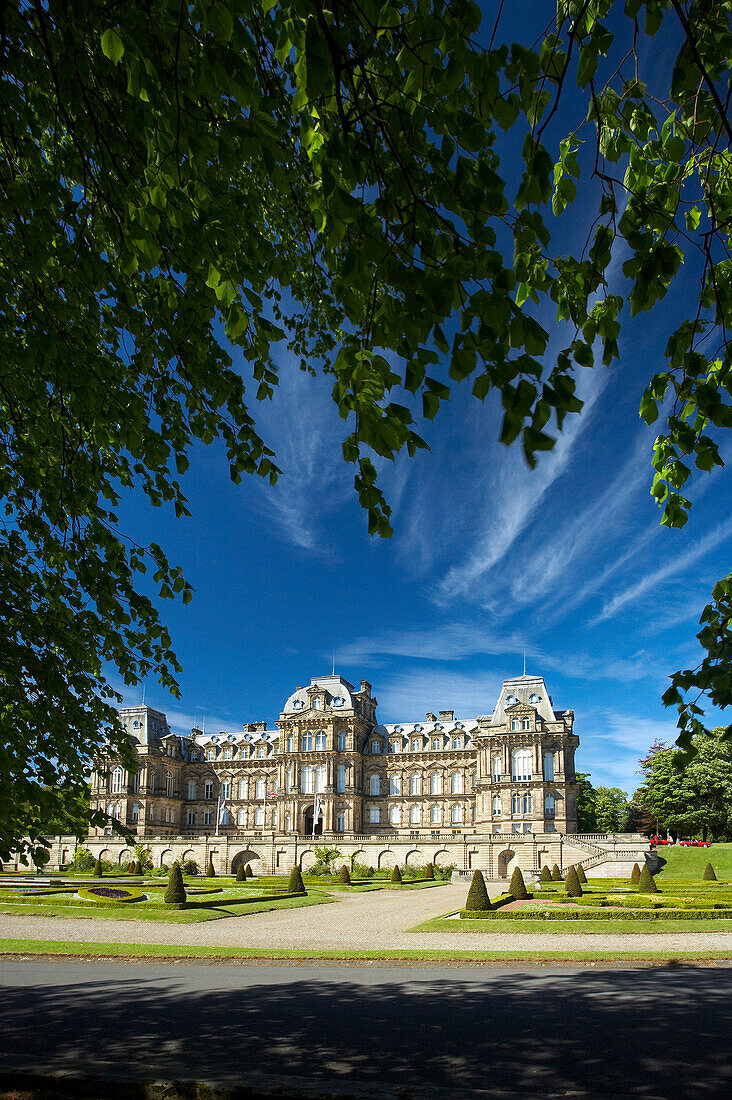 Bowes Museum framed by overhead branches, Barnard Castle, County Durham, UK, England