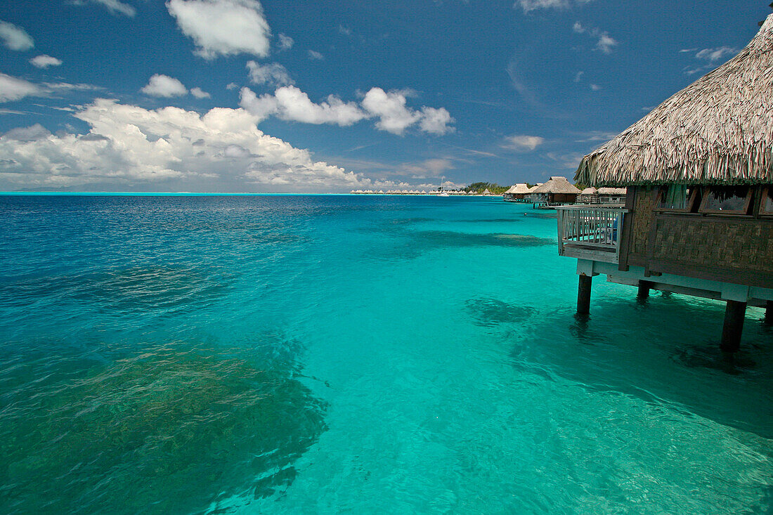 Overwater bungalow and view over lagoon, Bora Bora, Bora Bora, Society Islands