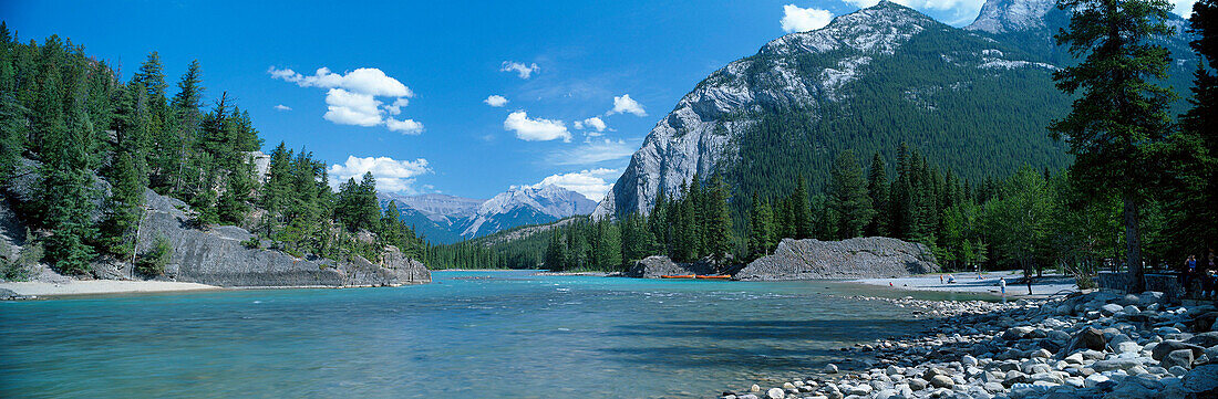 View of River and Mountains, Bow River, Alberta and The Rockies, Canada