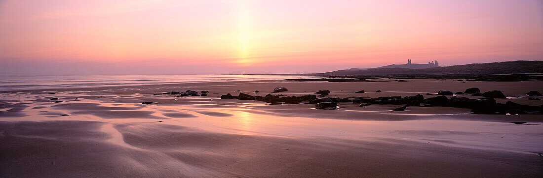 Dunstanburgh Castle & Embleton Bay at Sunrise, Embleton, Northumberland, UK, England