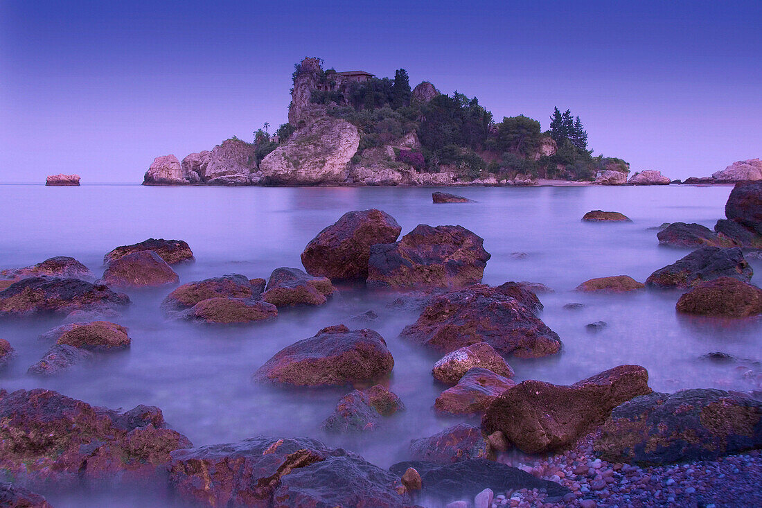 View of Isola Bella at dusk, Taormina, Sicily, Italy