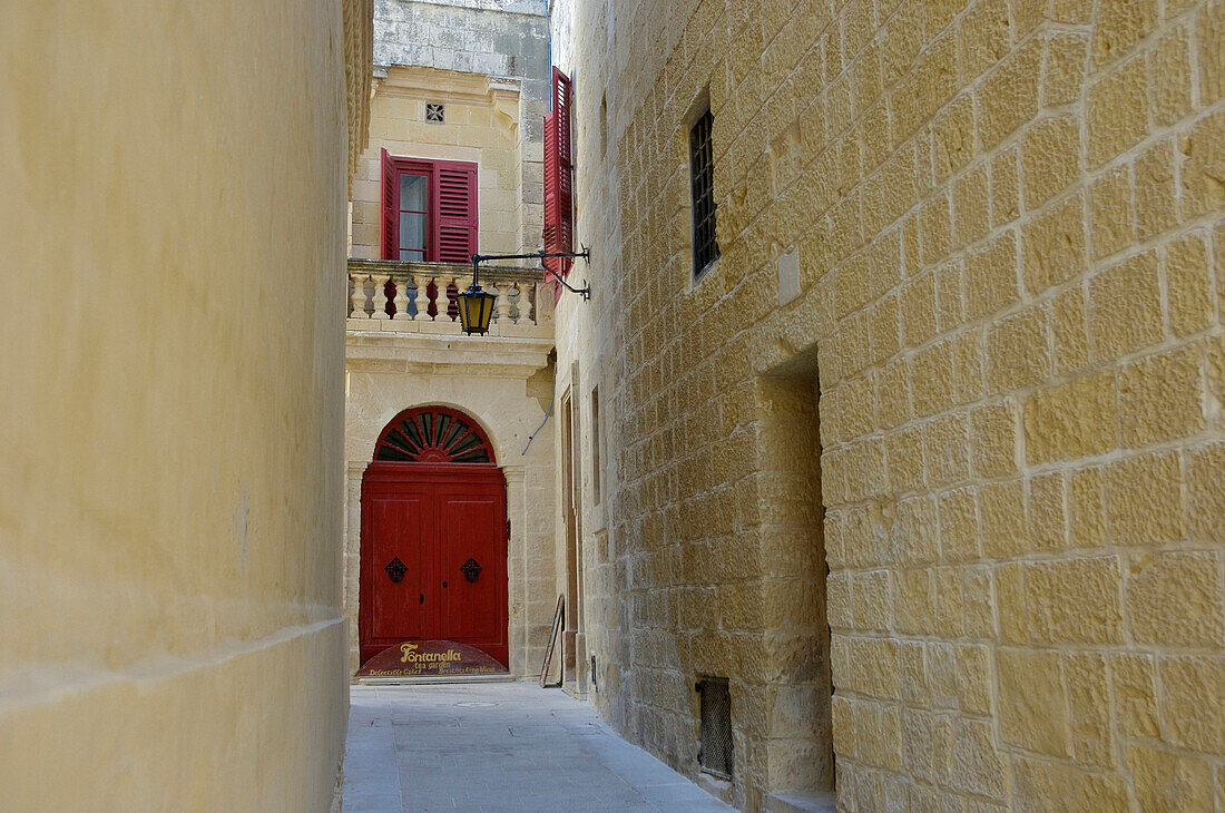Mdina street with red door, Mdina, Malta, Maltese Islands