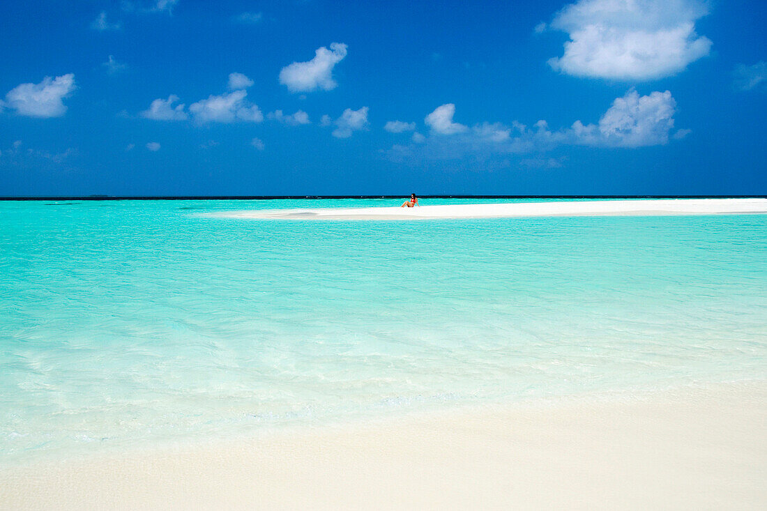Sunbather on deserted sandbank, General, The Maldives