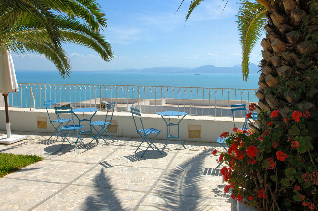 Restaurant terrace overlooking blue bay, Sidi Bou Said, Tunis, Tunisia
