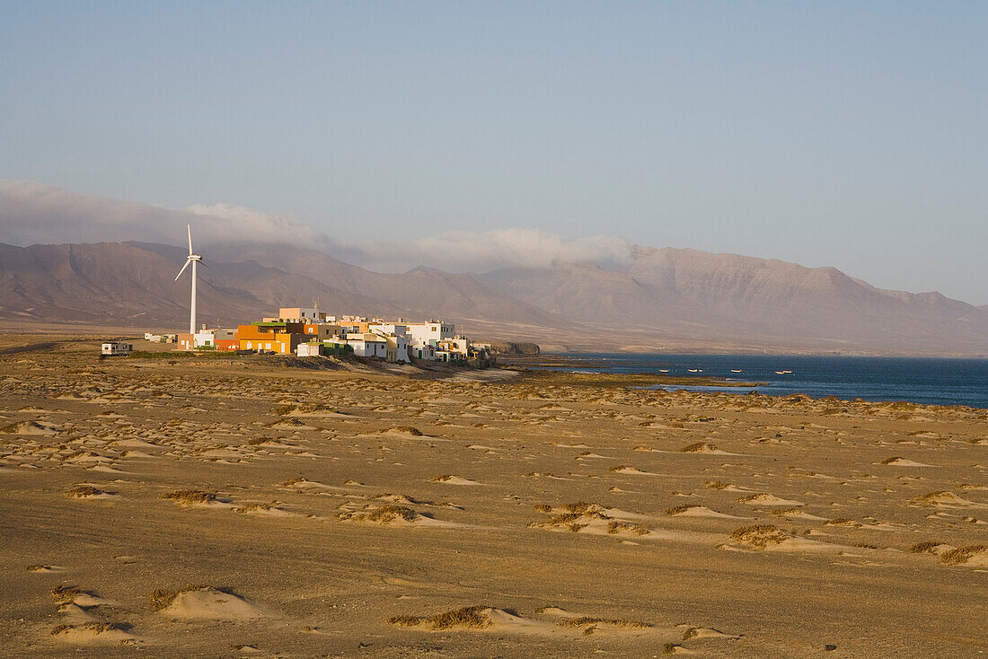 Sand and the village Puertito de la Cruz, Parque Natural de Jandia, Jandia peninsula, Fuerteventura, Canary Islands, Spain, Europe